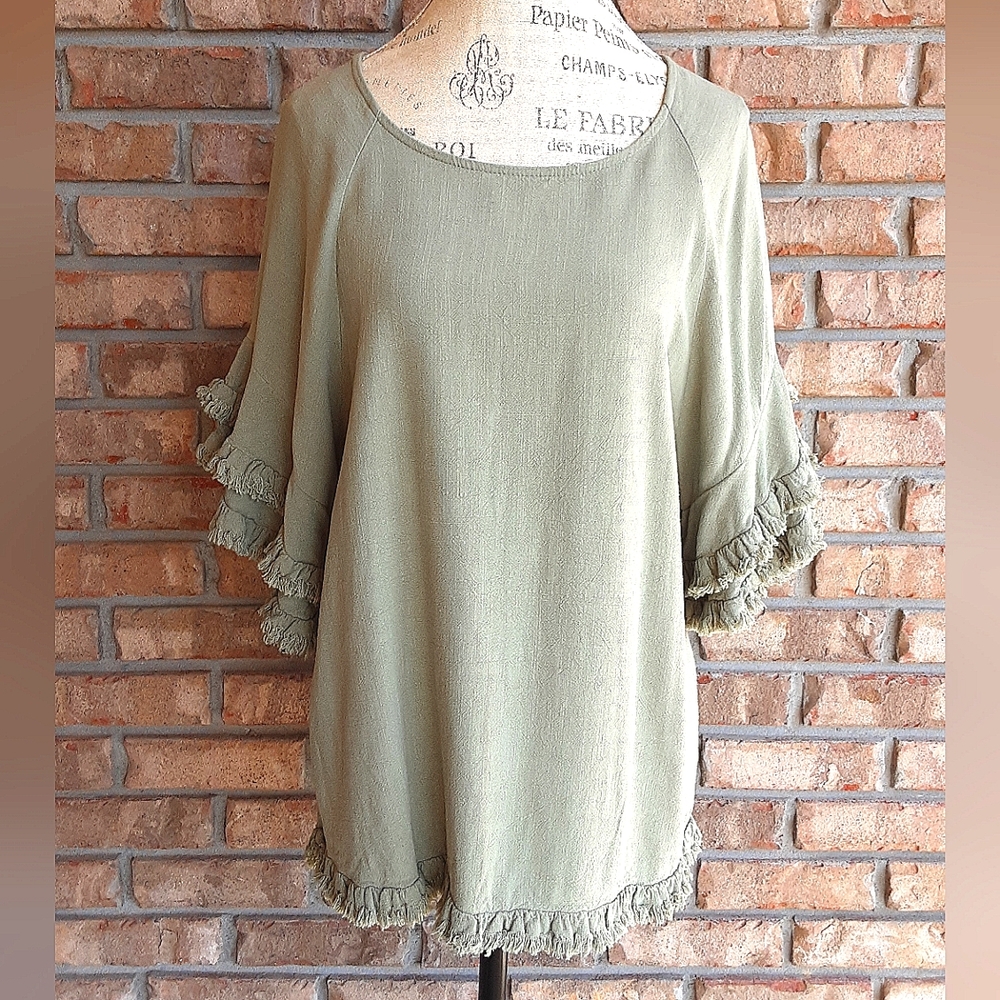 Umgee Boho Style Oversized Tunic Top with Fringe on Sleeve and Hem.